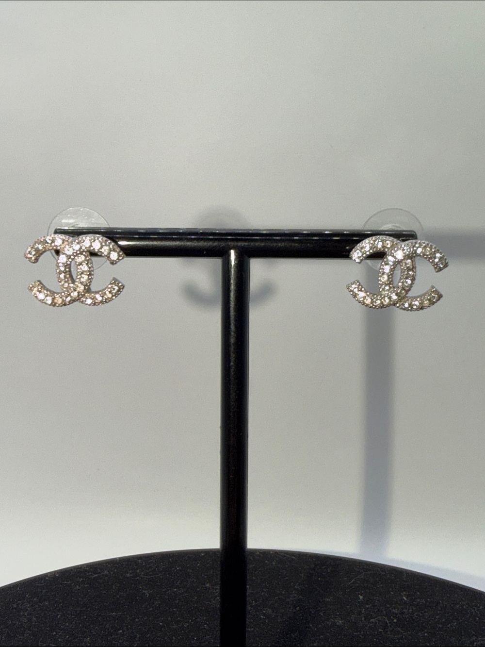 AUTHENTIC - CHANEL Crystal CC Logo Stud Earrings in Silver